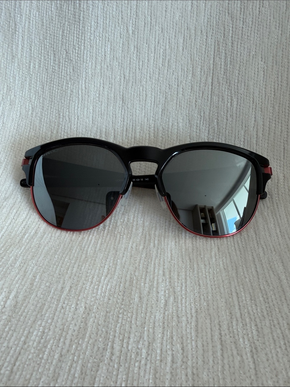 Oakley Latch Key Black and Red Round Frame Sunglasses
